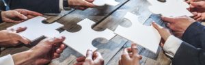 Business people and puzzle